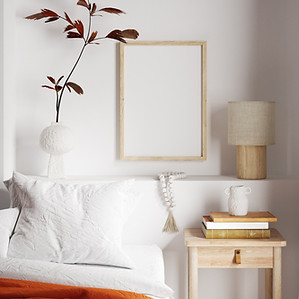 modern bed and bedside table with luxurious down pillow