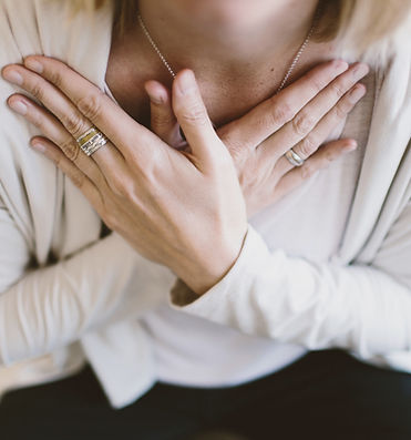 Hands on chest