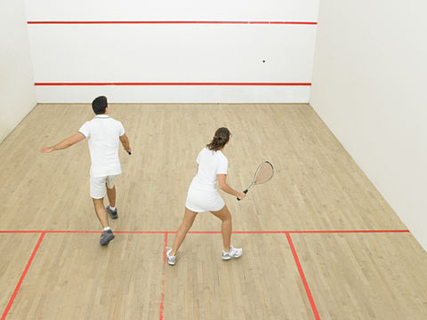 Couple Playing Squash