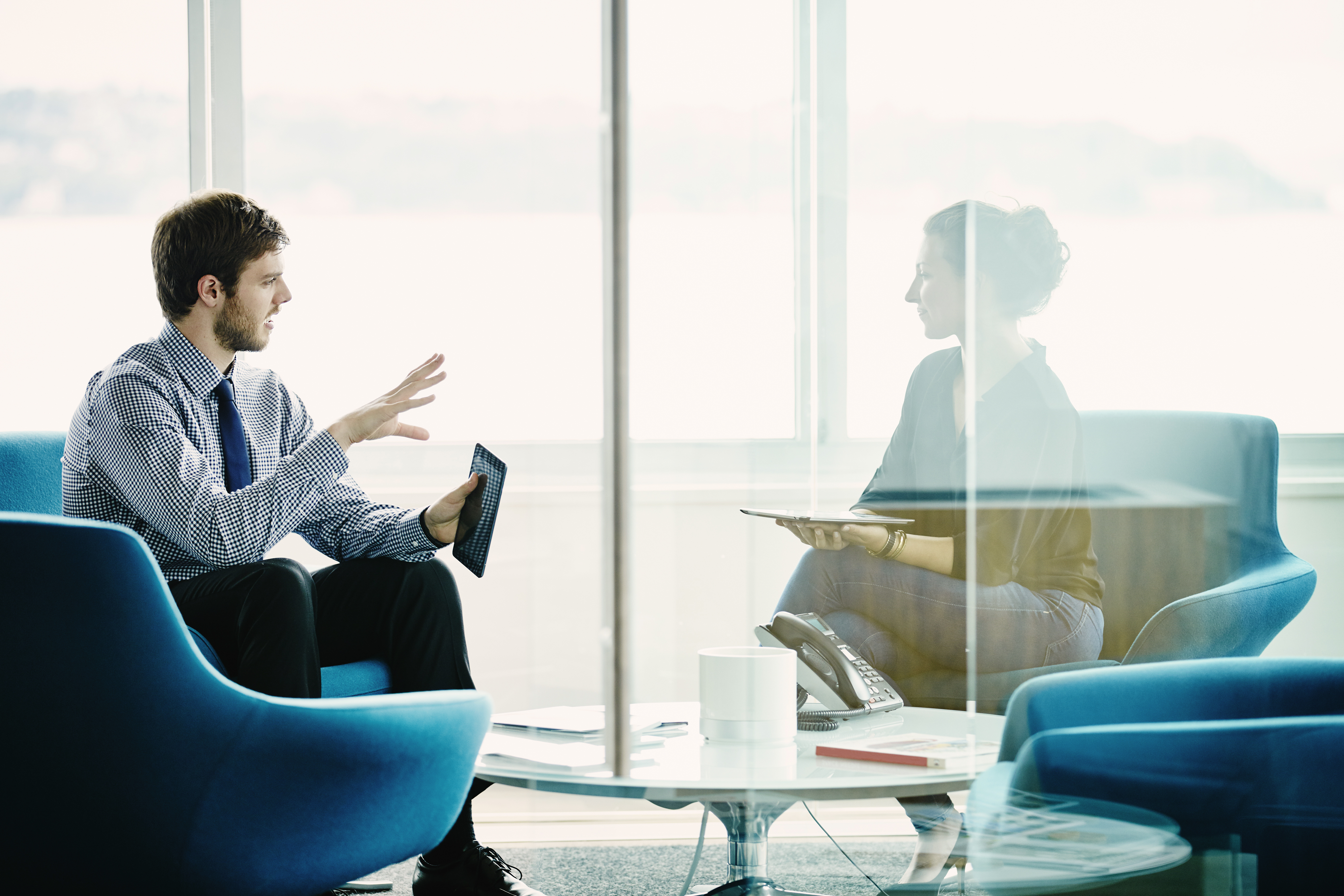 A group of people discussing the process of choosing the right nearshore software development partner