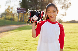 Girl Holding Baseball