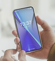 Cell phone in a person's hands about ready to make a phone call