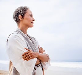 Woman practicing somatic therapy in nature 