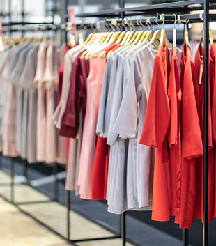 Clothes neatly displayed on a rack, symbolizing how Just Ask Amanda SEO customizes search engine optimization, SEO made simple, digital marketing, and web design strategies to fit every business.