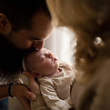 Parent Kissing Baby