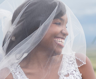 Smiling wedding couple outdoors