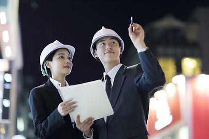 Engineers Pointing At Something