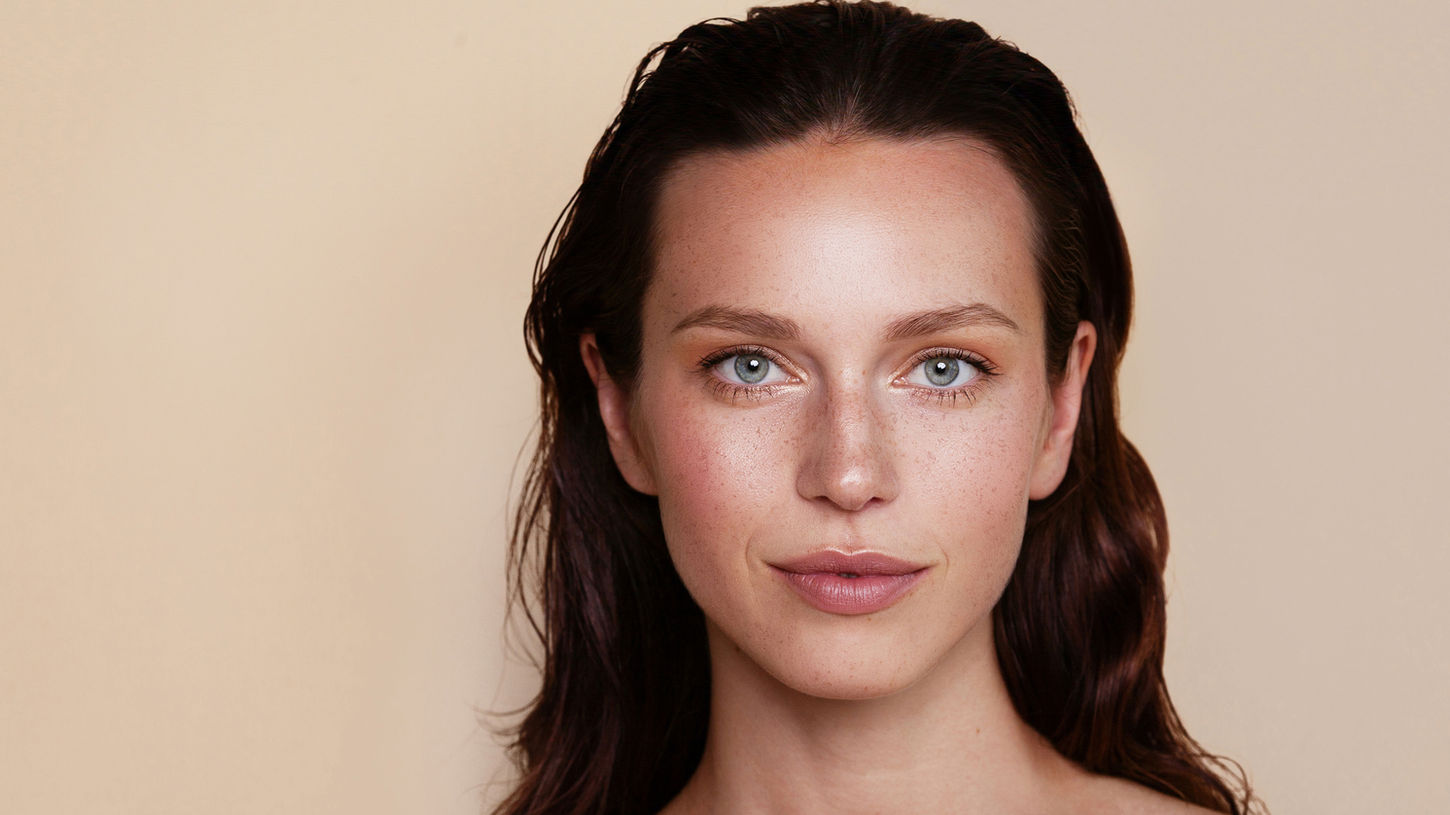 Woman after nose filler and lip enhancement at Coventry clinic