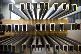 Aluminium bar clamps sit on a pallet