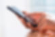 Close up of hands woman using her cell phone
