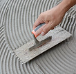 Trowel Applying Cement
