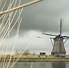 Windmill Amid Landscape