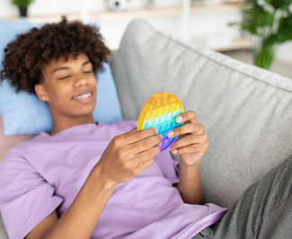 Man Holding Pop-It