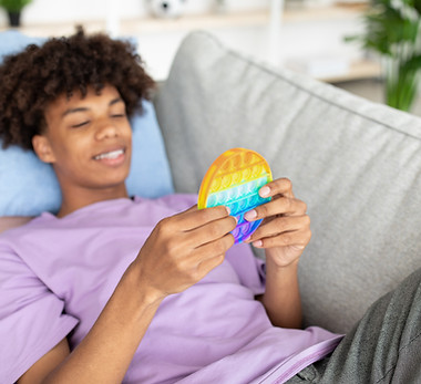 Man Holding Pop-It