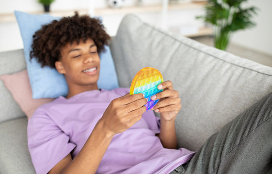 Man Holding Pop-It