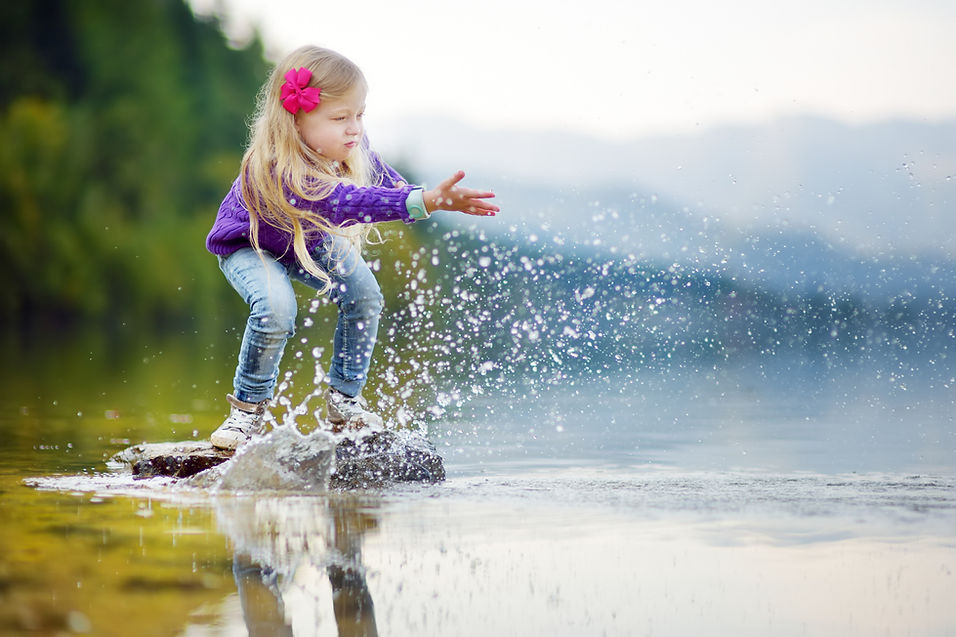 Girl playing in water