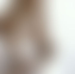 Bare feet, on tip toes, walking along a hard wood floor