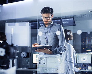 Team Working in the System Room