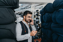 Man Looking at Tablet