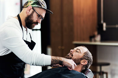 barber working on client
