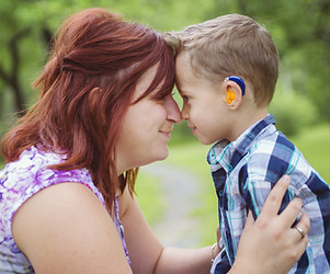 mum feeling close to her son while supported in her journey as a mum of a child with special needs