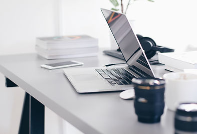 A desk with a lone computer.