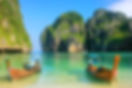 Two long tail boats at the beach
