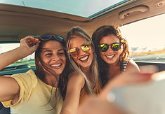Smiling Girls in Car
