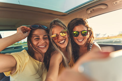 Smiling Girls in Car