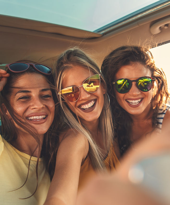 Smiling Girls in Car