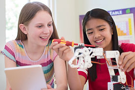 Girls Building Robot