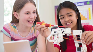 Girls Building Robot