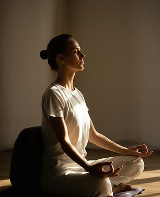 Woman Meditating in Sunlight