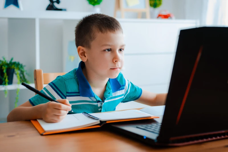 Child learning Spanish through engaging and interactive language activities