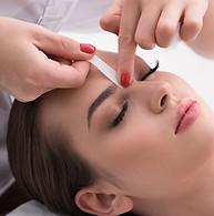 Eyebrow Wax treatment being undertaken