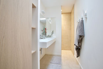 Minimalist living room design by My Life Is Better Today Pty Ltd for Sydney artist's studio apartment