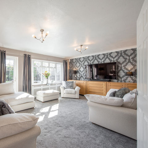 A general interior view of a living room lounge within a home