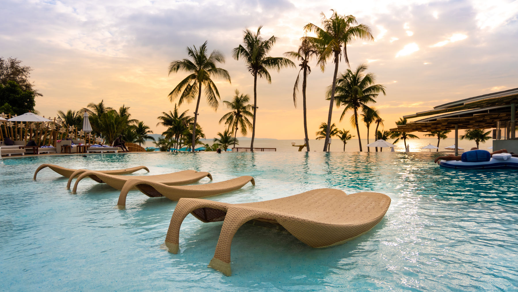 Luxury hotel pool at sunrise