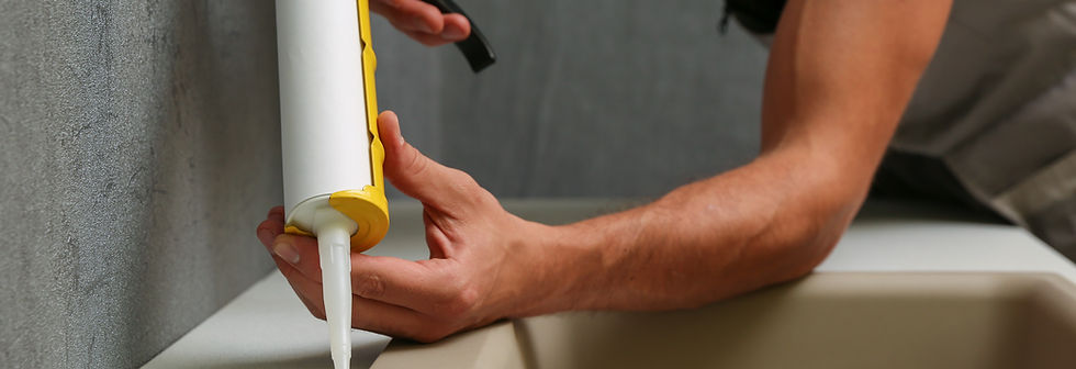 Applying Sink Sealant