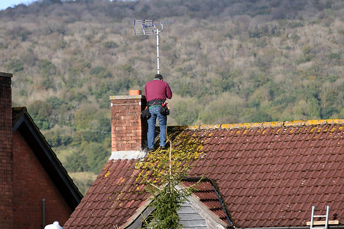Aerial repair man on a roof