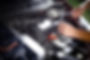 Auto mechanic repairing a car engine