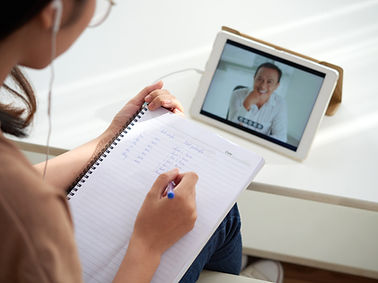Asian woman studying English online