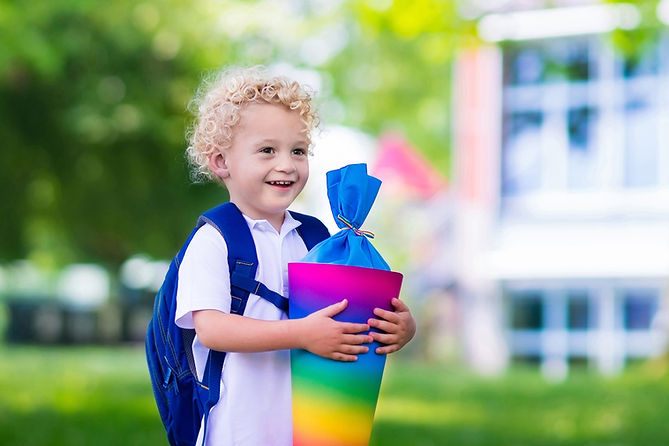 Boy Holding a School Cone