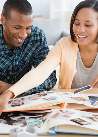 Couple Reviewing Album