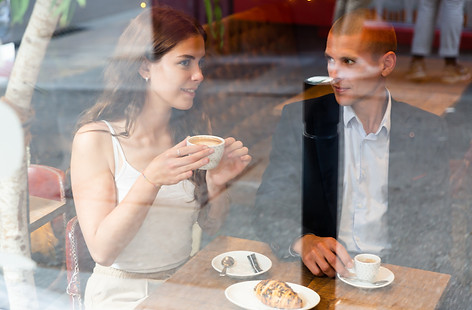Cup of coffee and croissant