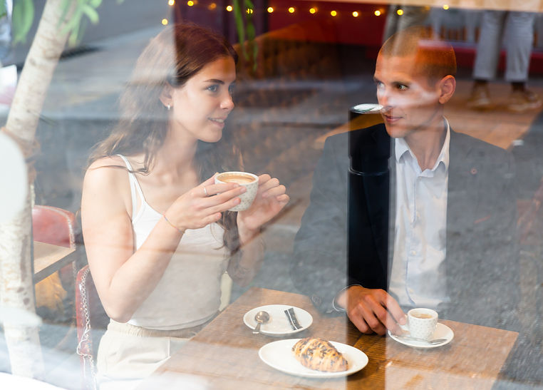 A couple on a date in a cafe