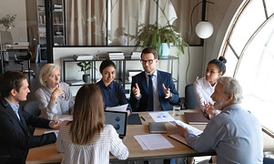 Business Meeting at Small Table