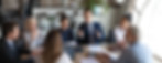 Business Meeting at Small Table