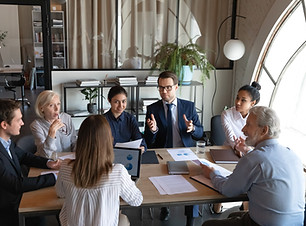Business Meeting at Small Table