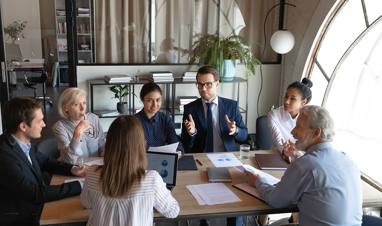 Business Meeting at Small Table
